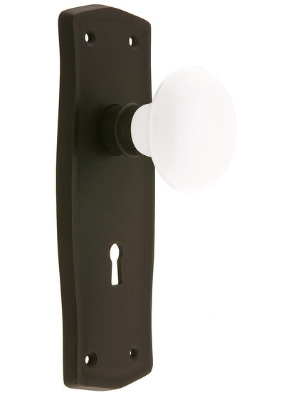 Prairie Style Door Set with White Porcelain Door Knobs Function in Oil-Rubbed Bronze Finish.